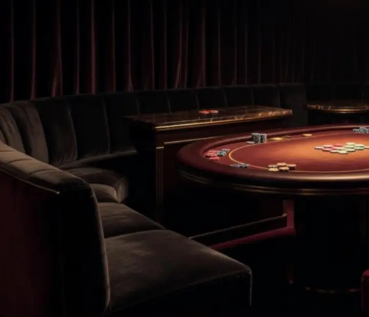 Mood-lit hidden poker lounge with leather tables and velvet drapes at Knave & Kitchen in Brisbane