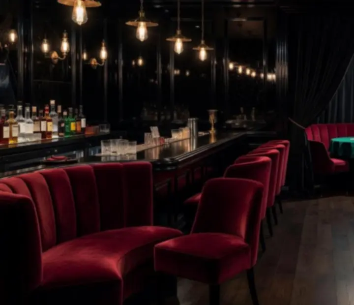 Ambient speakeasy bar in burgundy and gold tones connecting to a hidden poker lounge